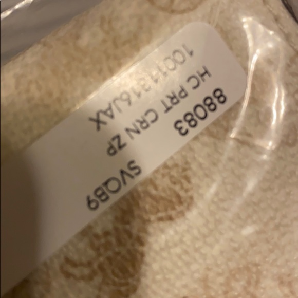 COACH Horse and carriage cream & beige wristlet - Picture 12 of 12